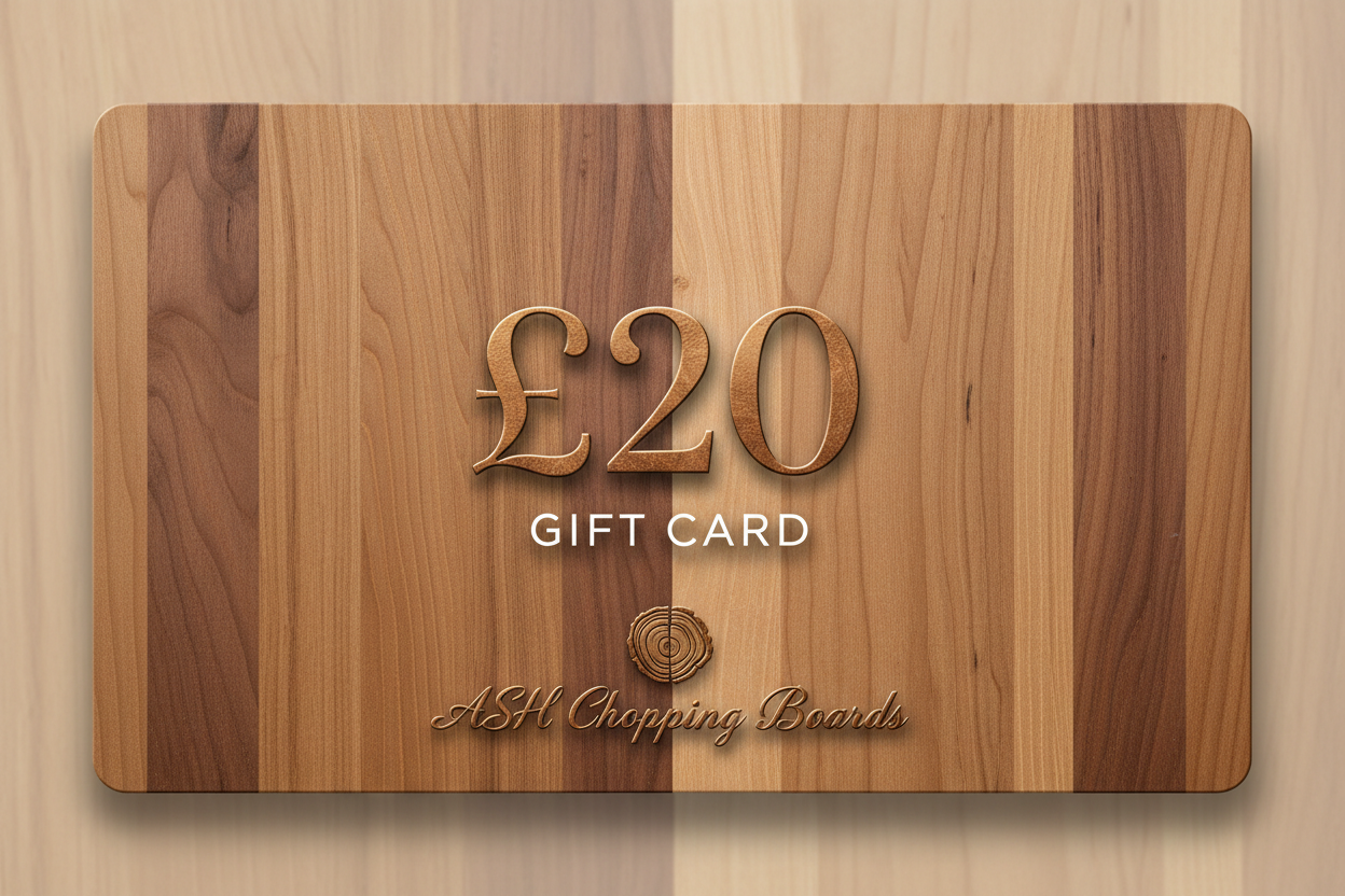 Wooden gift card with £20 value and 'ASH Chopping Boards' branding on a wooden background.