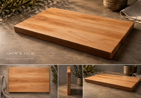 Wooden cutting board on a rustic surface with additional views and dimensions displayed.