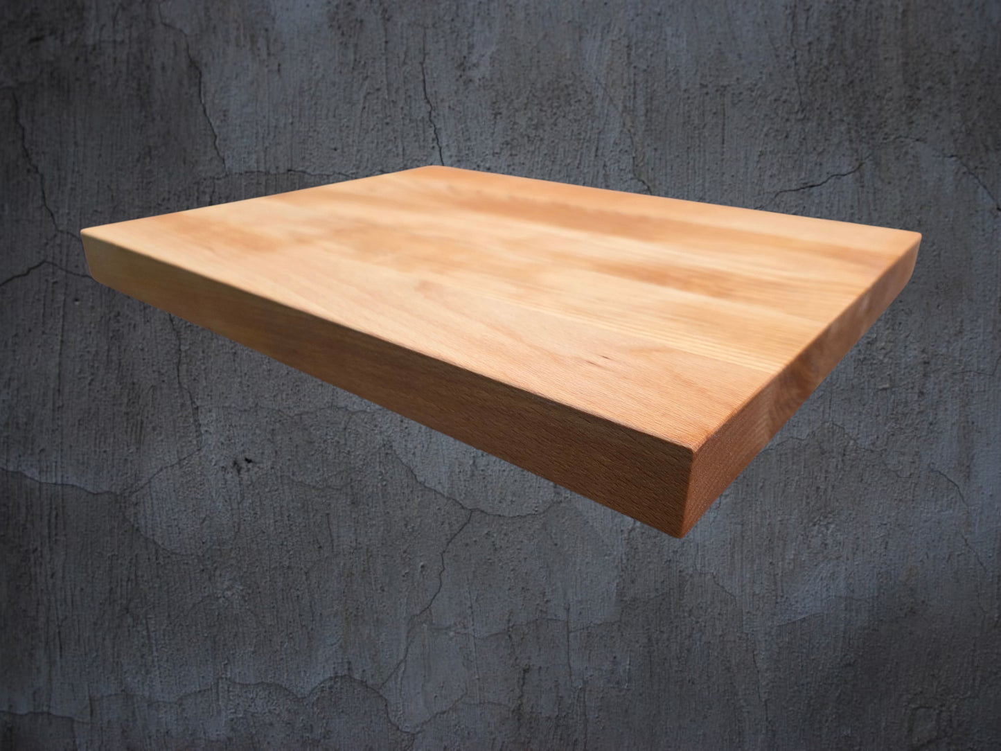 Ash chopping board in use preparing food in kitchen