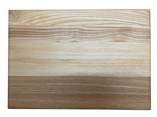 Ash chopping board with rounded edge used for serving bread and cheese