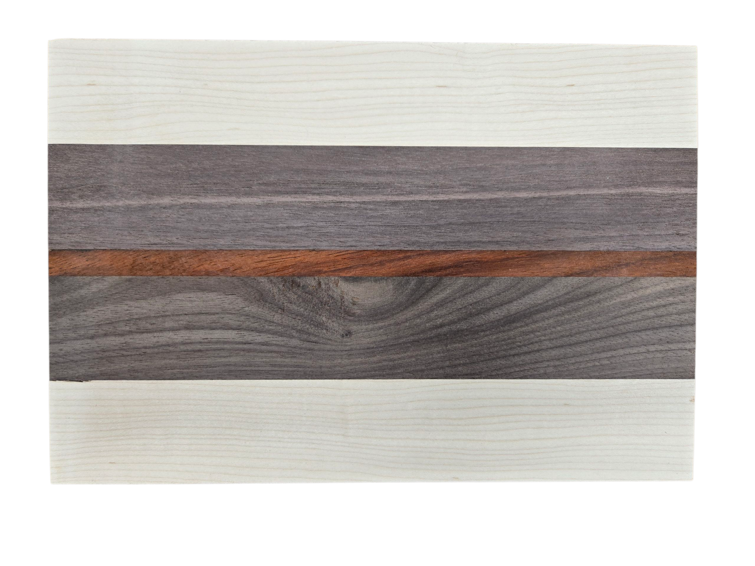 Close up of ash walnut and pink ivory wood grain on cheese board
