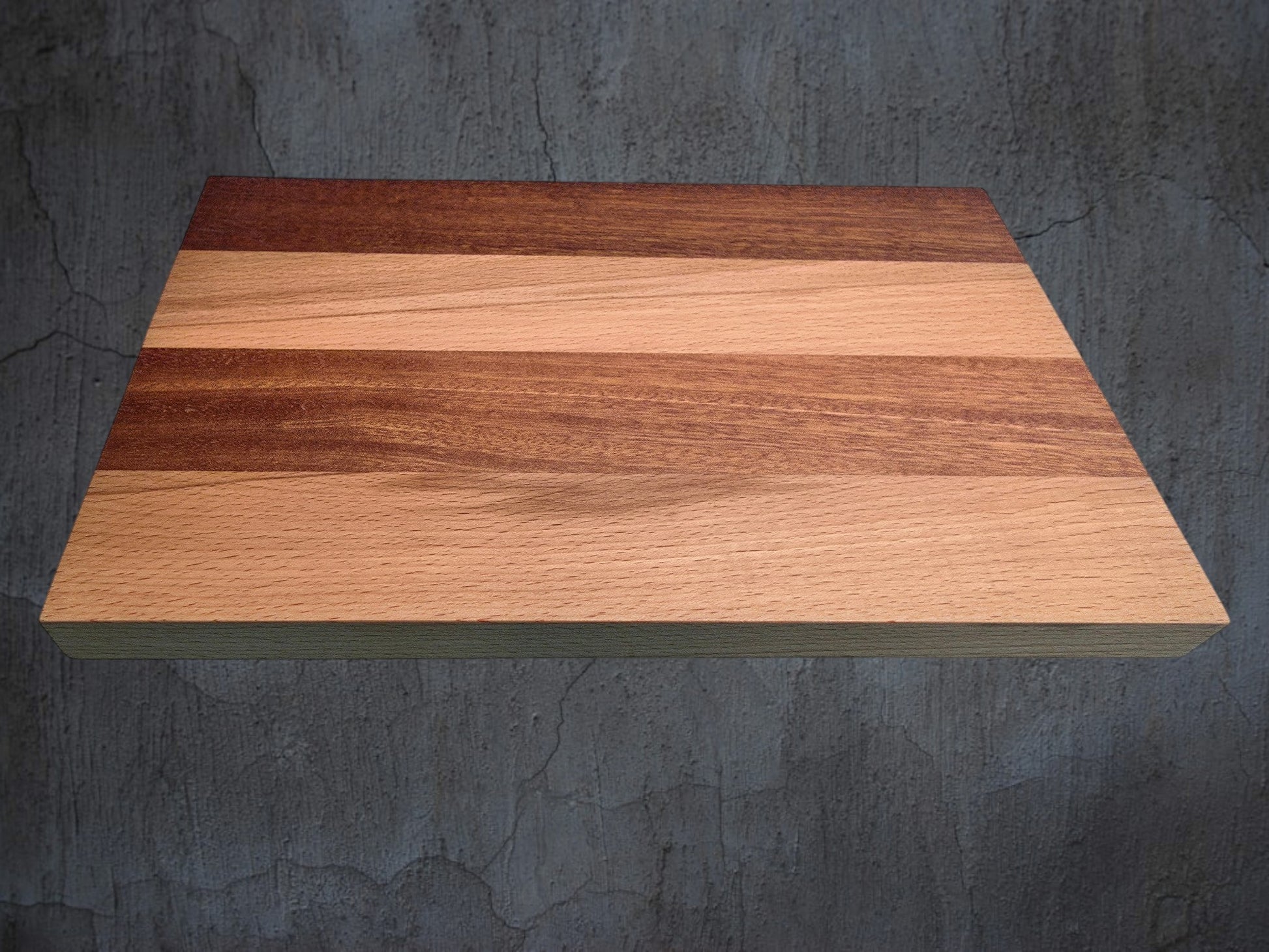 Cherry and walnut cheese board used for serving cheese and charcuterie