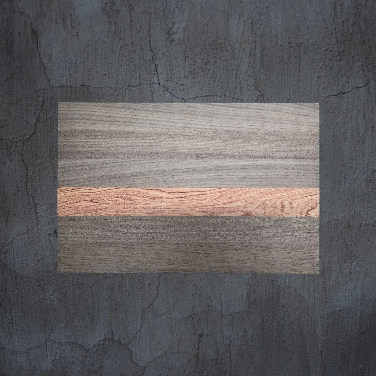 Walnut and pink ivory luxury cheese board displayed in kitchen setting