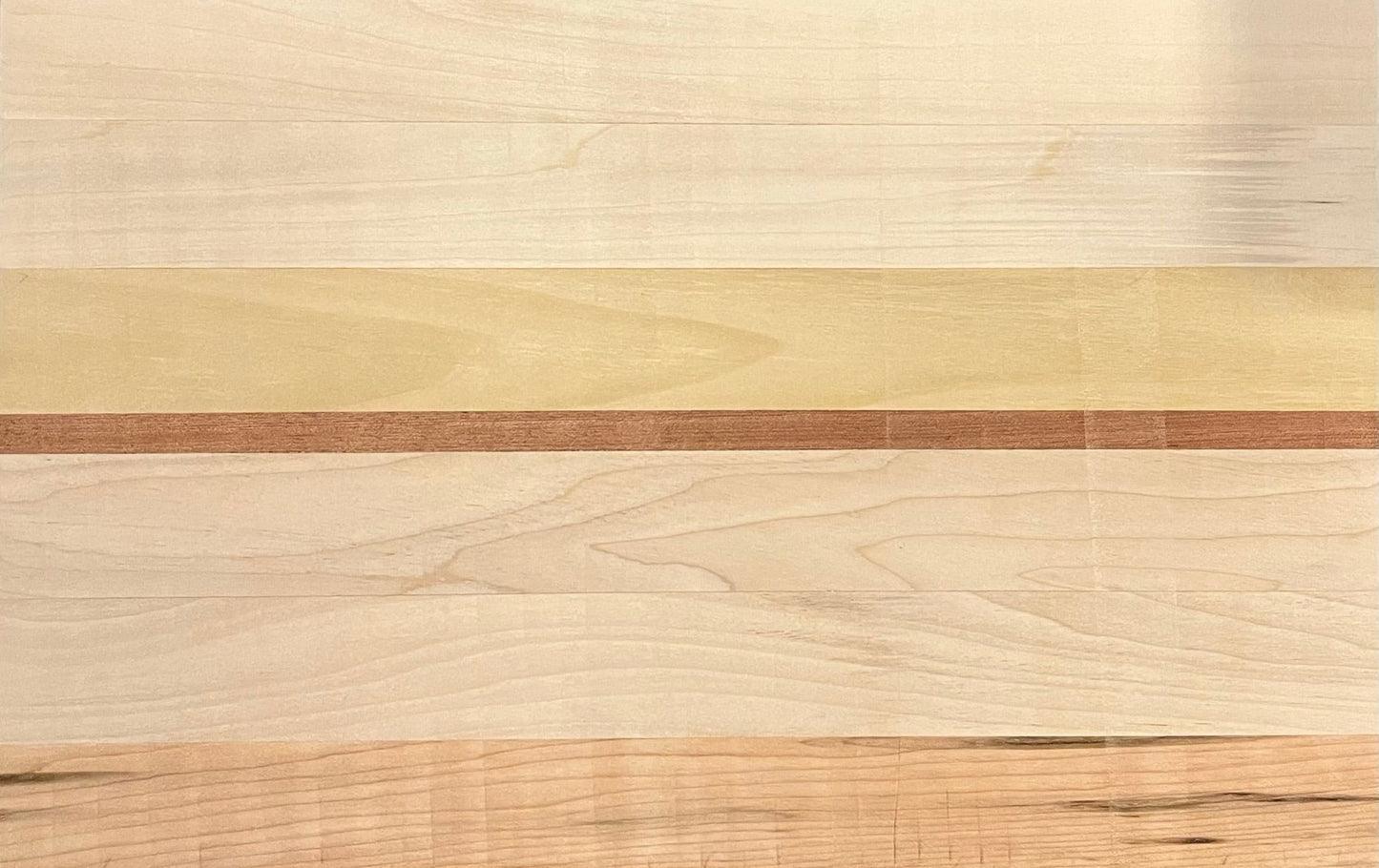 Close up of oak and walnut wood grain on premium cheese board