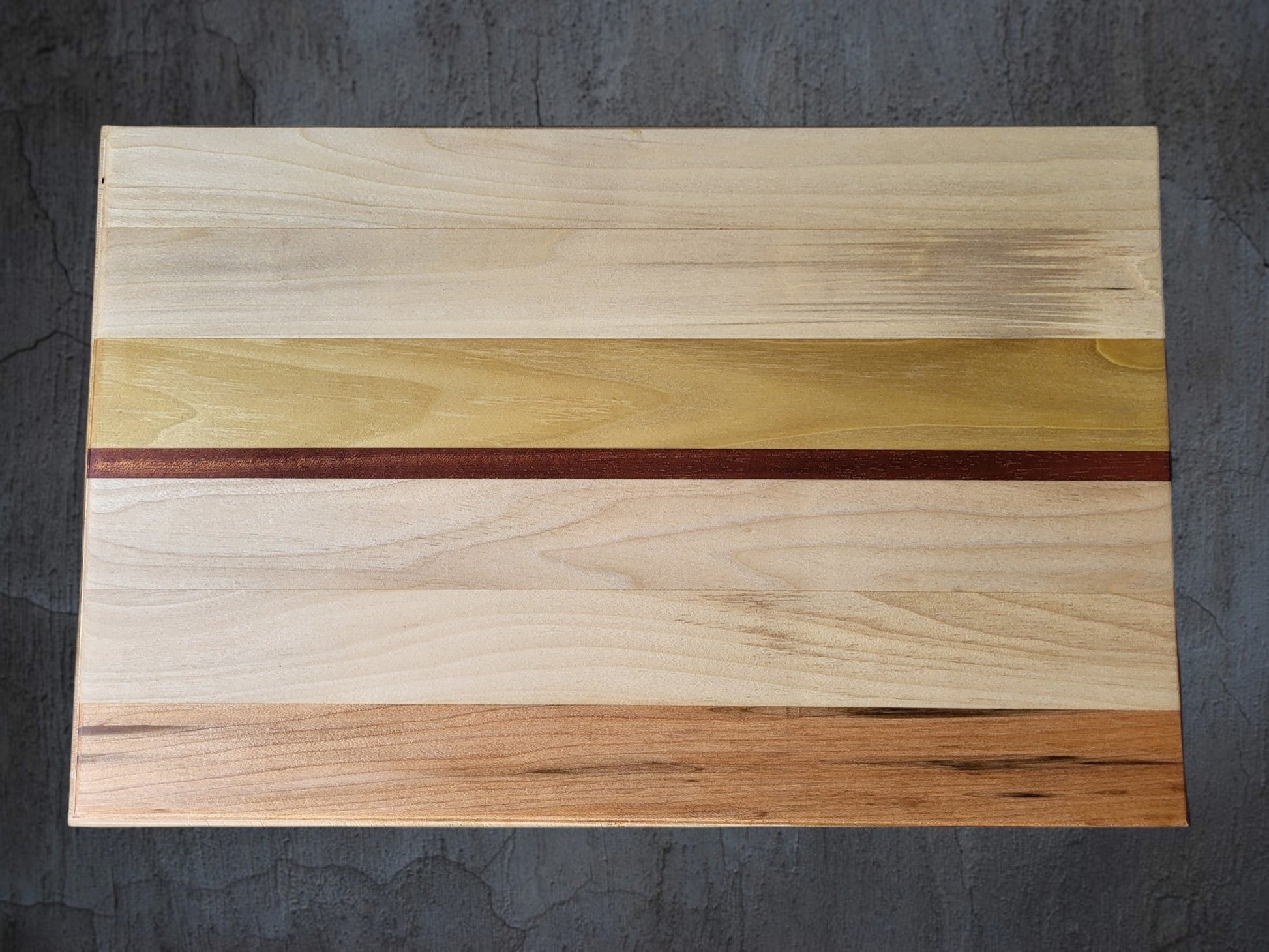 Oak and walnut premium cheese board serving cheese and charcuterie