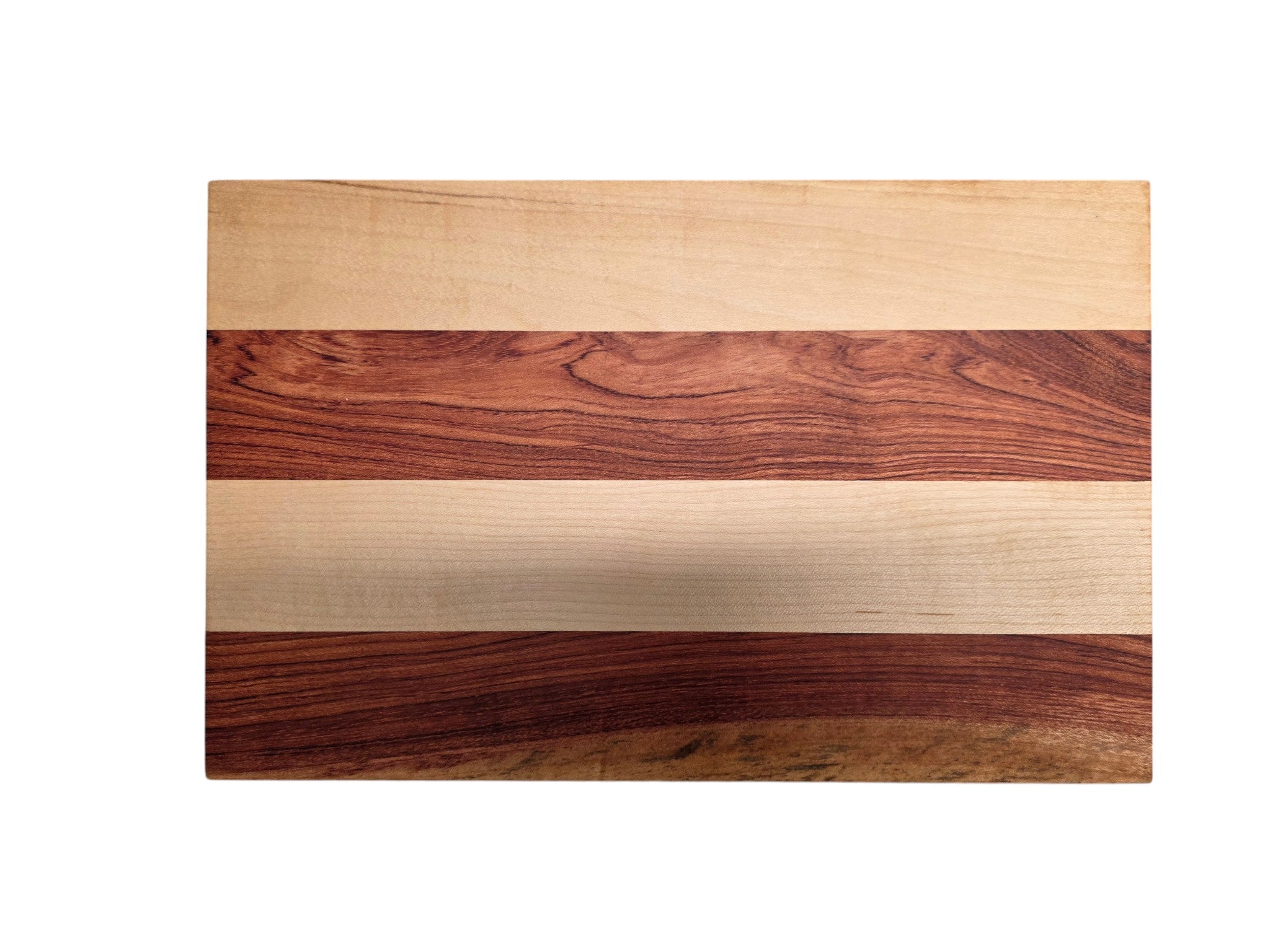 Close up of pink ivory and ash wood grain on handmade cheese board