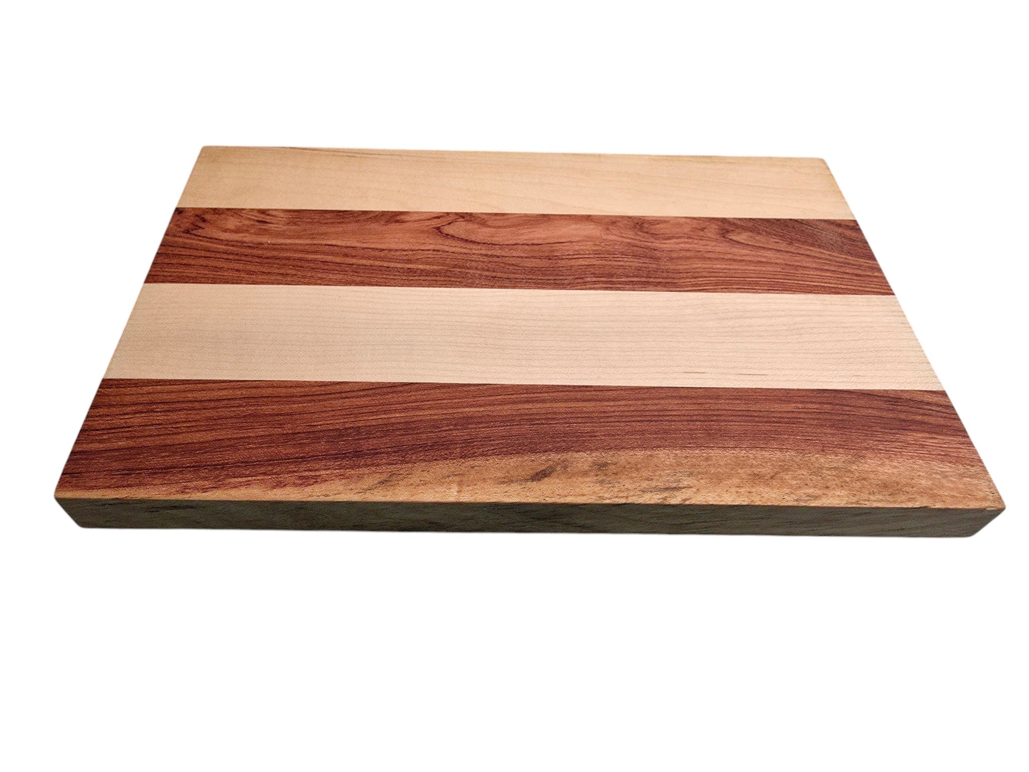 Pink ivory and ash cheese board used for serving cheese and charcuterie