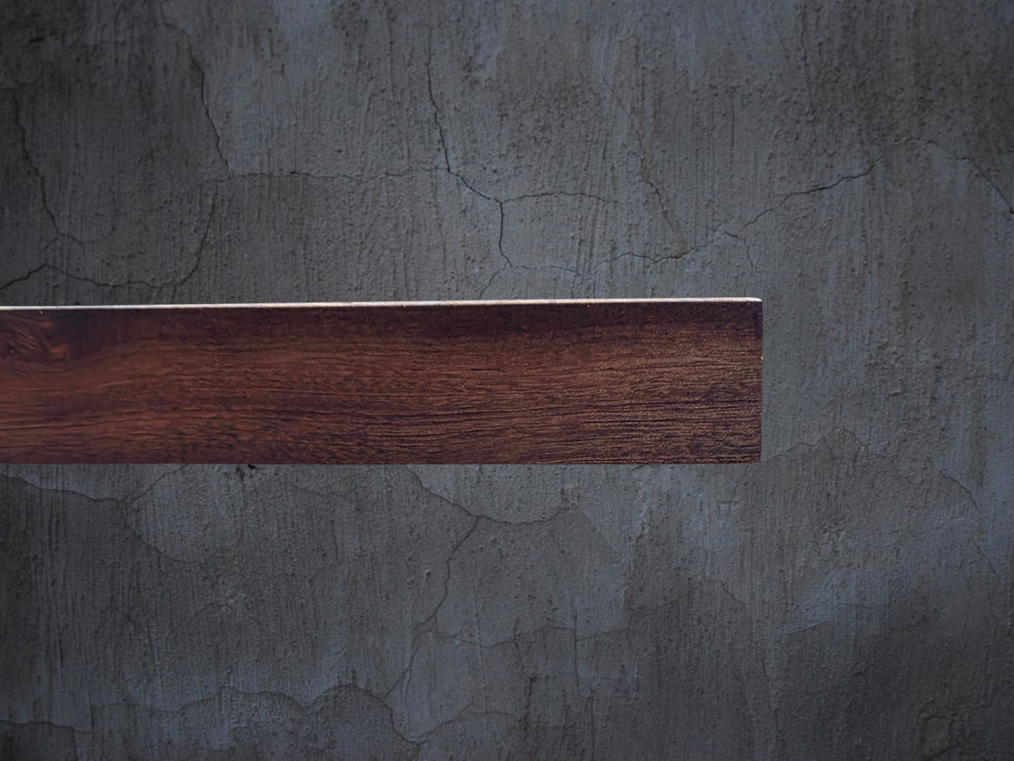Sapele chopping board used for serving bread and cheese