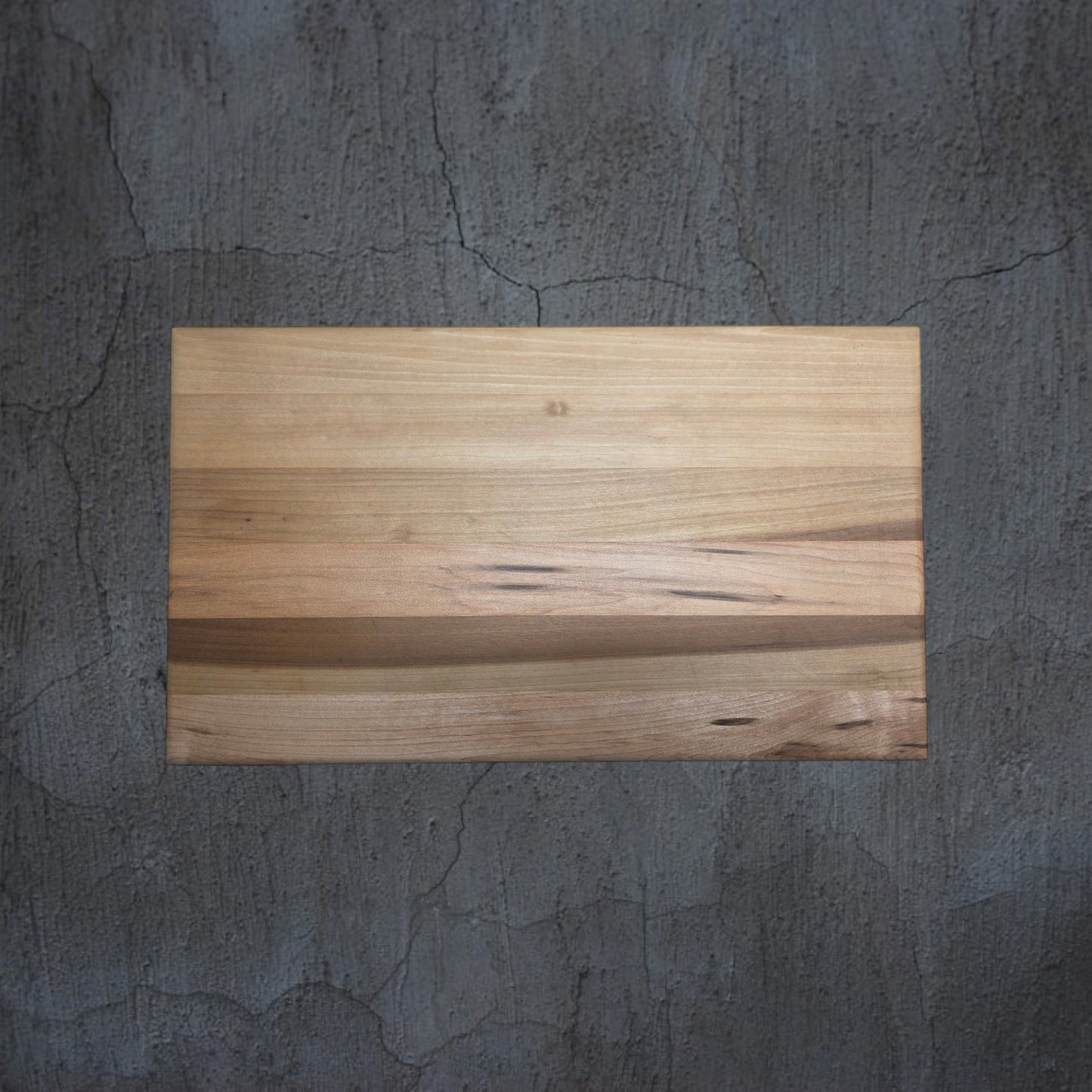 Close up of solid oak wood grain on handmade cheese board