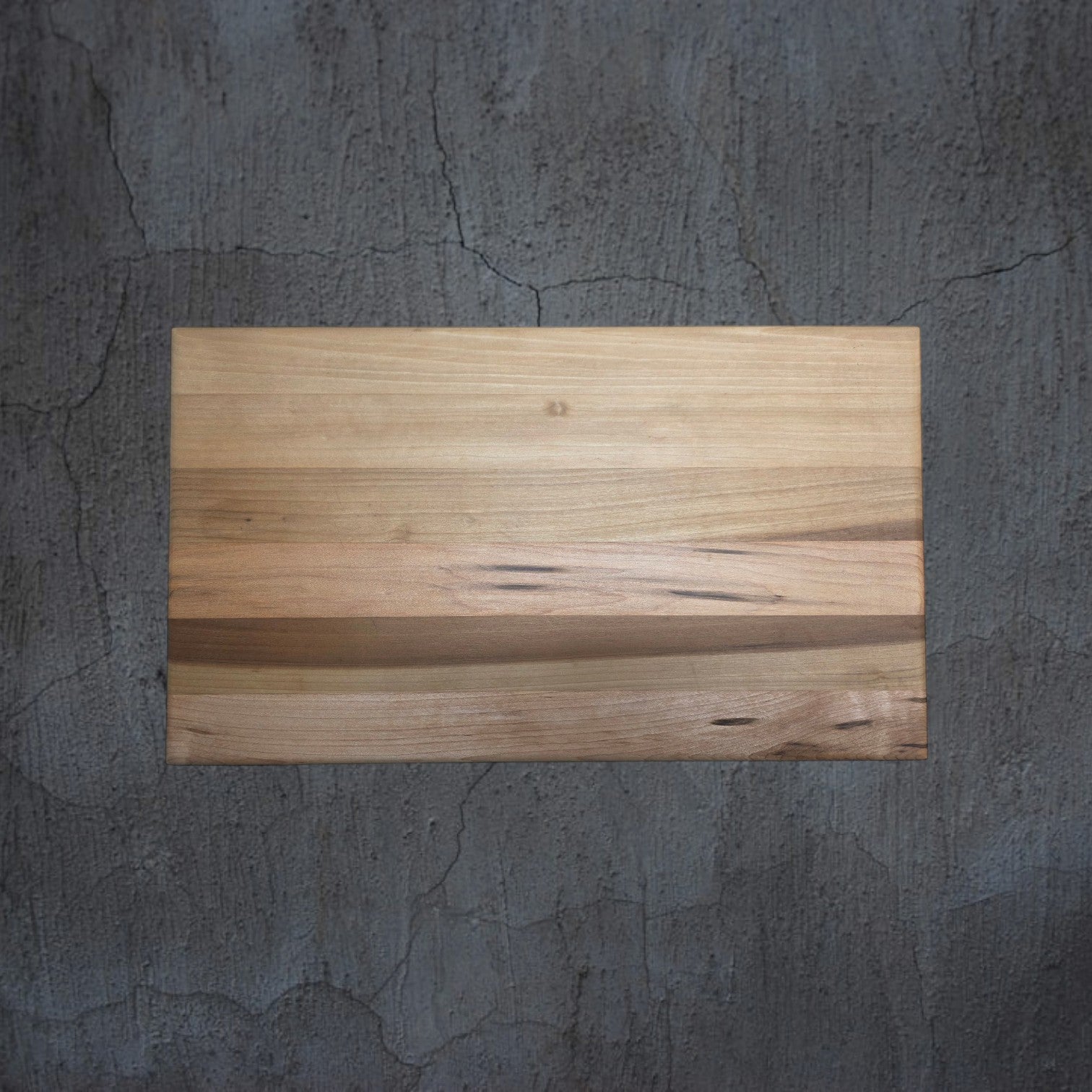 Close up of solid oak wood grain on handmade cheese board