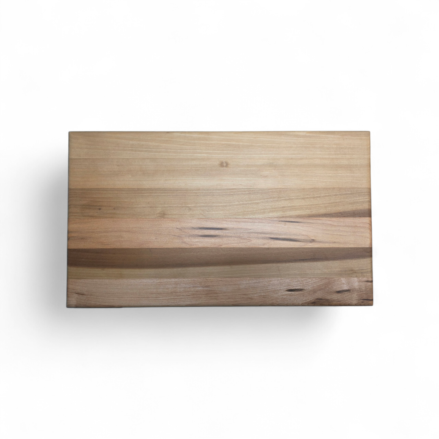 Close up of solid oak wood grain on handmade cheese board