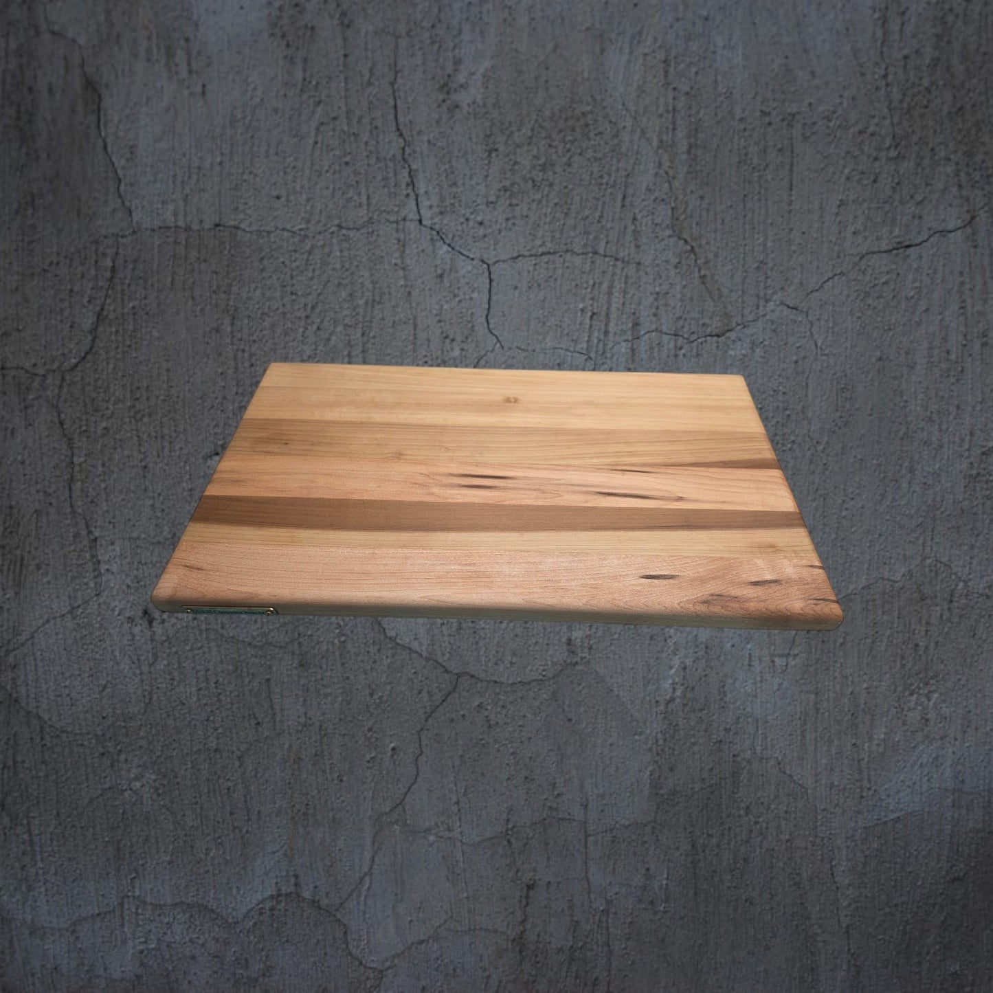 Solid oak cheese board serving cheese and charcuterie
