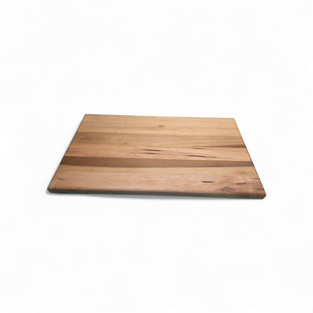 Solid oak cheese board serving cheese and charcuterie