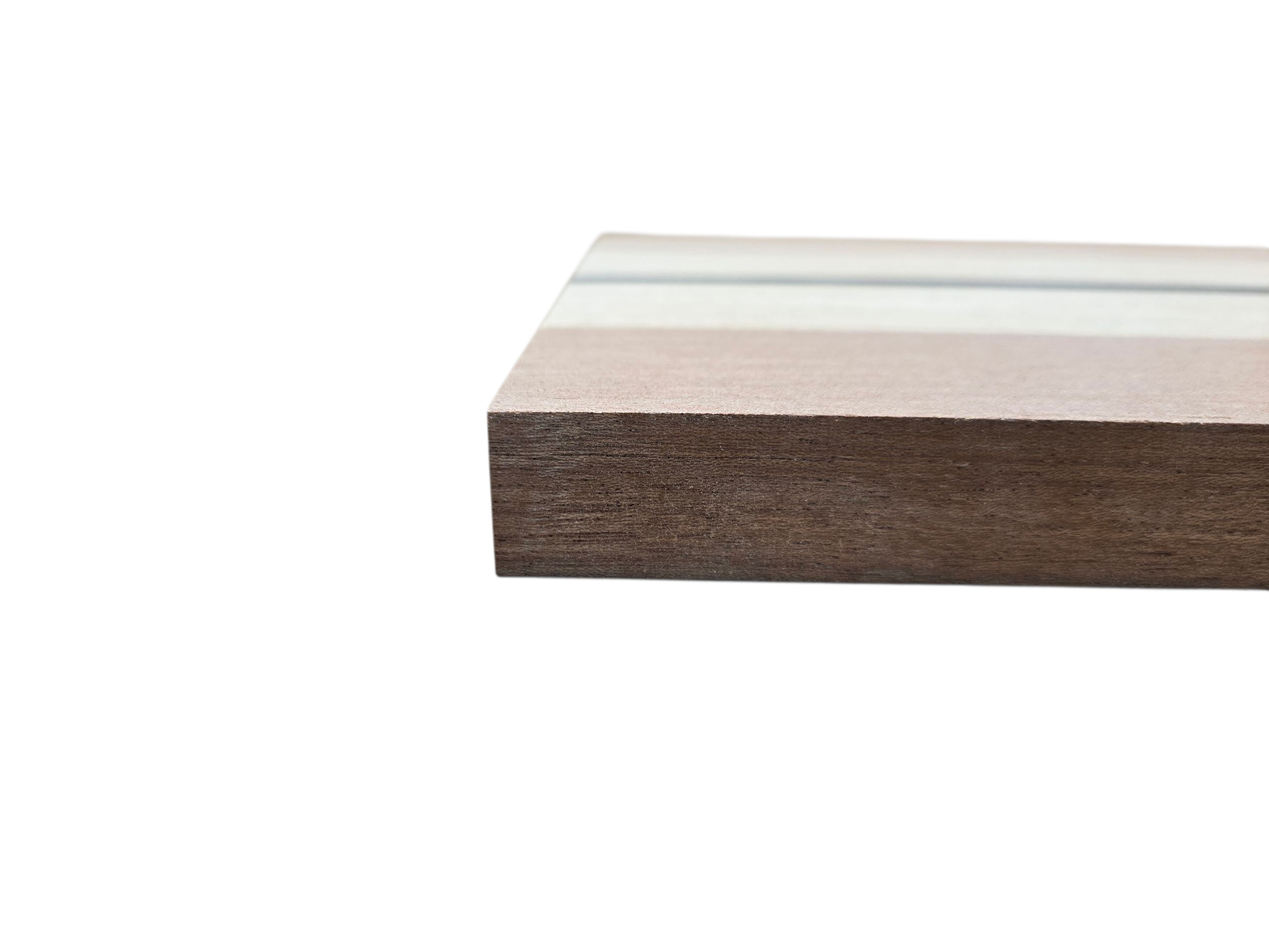 Walnut oak and ebony wooden cheese board displayed in kitchen setting