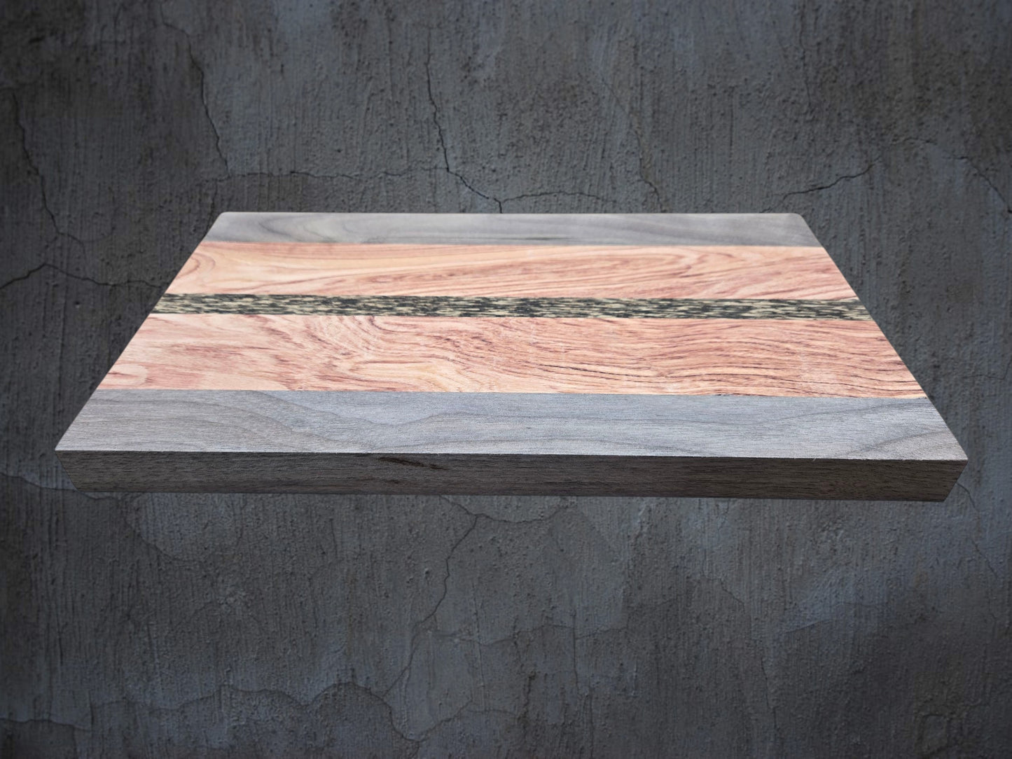 Walnut pink ivory and black palmwood cheese board used for serving cheese and charcuterie